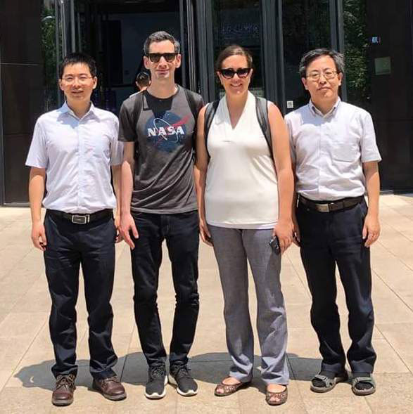 Dr. Holland with Profs. Xi-Qiao Feng, Bo Li and Dongdong Wang